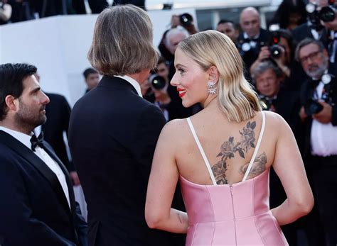 Scarlett Johansson flashes back tattoos on the 2023 Cannes Film ...